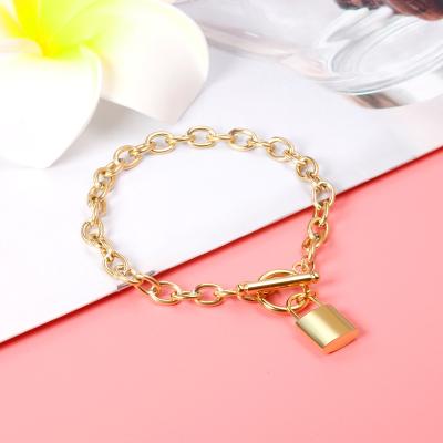 China Trendy Waterproof Shiny Solid Gold Filled Lock Bracelet Jewelry Durable Stainless Steel Women Bracelet Jewelry for sale