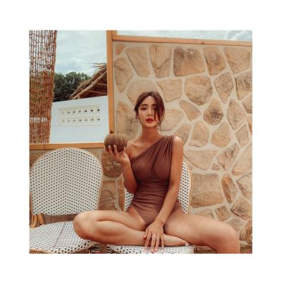 China Factory direct sales wholesale one-piece body solid color off shoulder hot spring swimsuit breathable vacation for female for sale