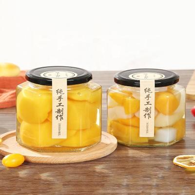 China Beverage Factory Wholesale Hexagon Glass Bottle 500ml Creative Jam Honey Jar Pickles Bottle for sale