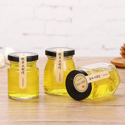 China High Quality Viable Mini Round Food Grade Small 30ml Honey Jar Glass With Metal Lid for sale