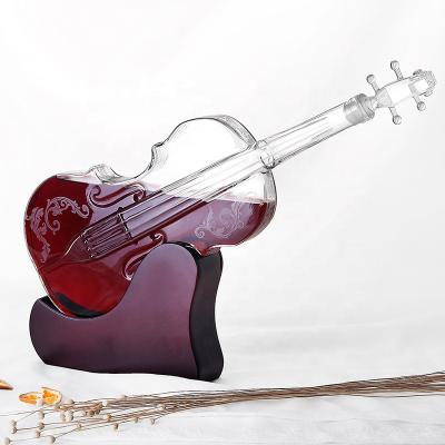 China Best Selling Wine Fashion Clear Creative Empty Violin Shaped Liquor Bottle for sale