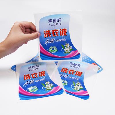 China Bright White Coloredr CMYK Waterproof Waterproof PE Material Packaging Sticker Customized Self Adhesive Logo Bottle Stickers Labels for sale