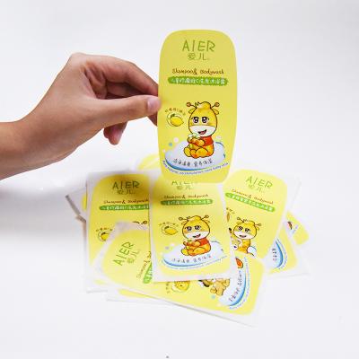 China CMYK PE Material Self-adhesive Label Sticker Custom Bright White Paper Waterproof Packaging Printing Logo Trade Mark Labels Roll for sale