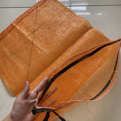 China Agriculture raschel mesh bag for fruit vegetable mesh bag with suction twine pp gauze mesh bag for sale