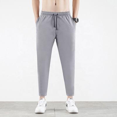 China Breathable Quick-Drying Elastic Soft Sports Tracksuit Sports Causal Office Sports Training Outdoor Pants Trousers for sale