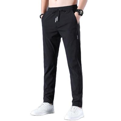 China Summer Breathable Thin Casual Pants Loose Ice Sports Trousers Leisure Trend Polyester Silk Pants for sale