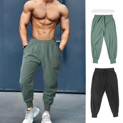 China Breathable Lightweight Drawstring Joggers Pants Workout Running Outdoor Sports Casual Sweatpants Mid Waist Sweatpants for sale