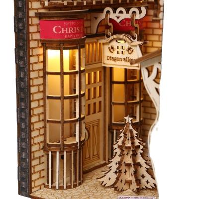 China Eco-friendly laser cutting wooden diy miniature book house bookends nook kit magic 3d puzzle house assemble toys for sale