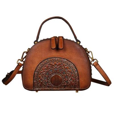 China GENUINE LEATHER Top Handle Genuine Leather Handbag Retro Skin Totem Pattern Messenger Natural Handbag for sale