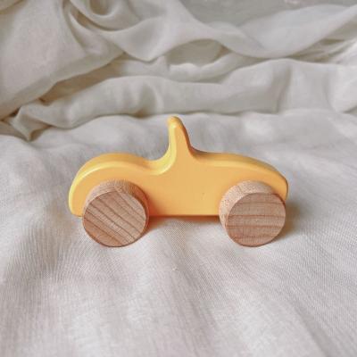 China Early Education Baby Grasping Training Carts Solid Wood Infant Wooden Puzzle Toys Car Toy Car Trolley Carts for sale