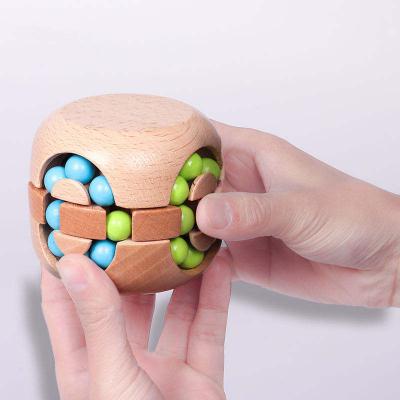 China Wooden Kids Spinning Magic Bead Toys Brain Teaser Game Funny Wooden Puzzle Toys for sale