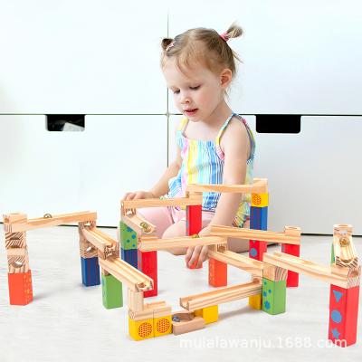 China Building Toy Wholesale Montessori Children's Puzzle Stacked Marbles Highs Assembled Building Block Sets Wooden Marble Run Toys for sale