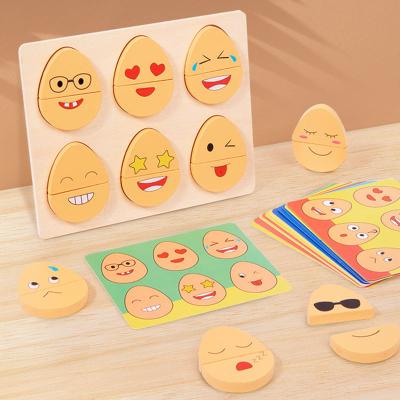 China DIY TOY Hot Selling Wooden Puzzle Funny Training Parent-child Coordination Hand-eye Eggs Interactive Expression Toys for sale