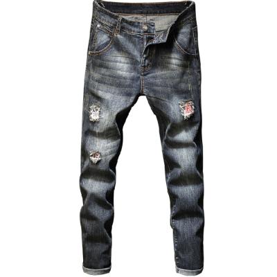 China New Men's Breathable Skinny Jeans Dark Blue Ripped Holes Jeans Men's Casual Jeans for sale