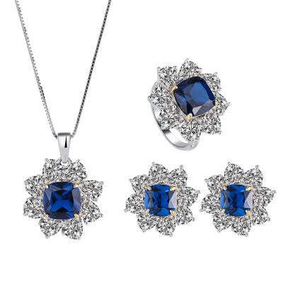 China FASHIONABLE Hot Selling Jewelry S925 Flower Jewelry Set Artificial Sapphire Ring Silver Sapphire Ring Earring Pendant Set for sale