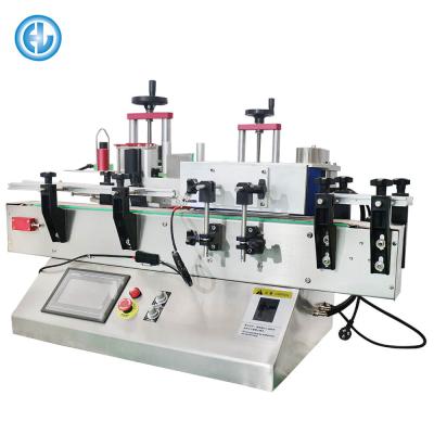 China CLOTHING easy to use automatic tabletop sticker round bottle adhesive labeling machine for sale