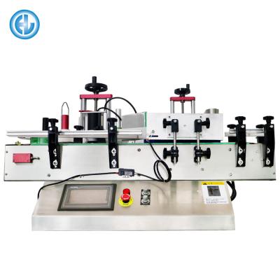 China HL CLOTHING Table Top Small Vial Sticker Automatic Round Bottle Labeling Machine Price for sale