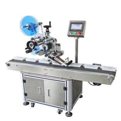 China UBL CLOTHING Factory HL-T-300 Unveiled Box Labeling Machine for sale