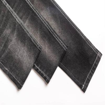 China Breathable Popular Super Stretch Denim Fabric Jeans Jet Black Comfortable Textile Denim Fabric for sale