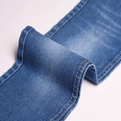 China Breathable Stretch 8+8*10/40 Indigo Denim Fabric Comfortable Shrink Resistant 10.7oz Jeans for sale