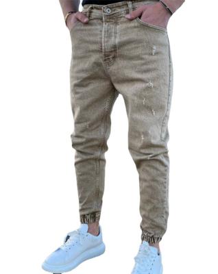 China Breathable New Style Tapered Denim Men's Pants With Holes In Trend Color Slim Fit Denim Pants For Men for sale