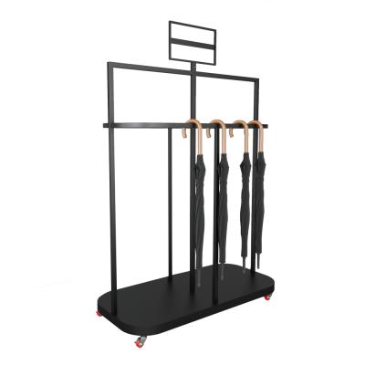 China Deploying Umbrella Xiamen Yiree Retail Store Metal Wood Display Rack High End Stand For Umbrella Cover With Signage Holder for sale