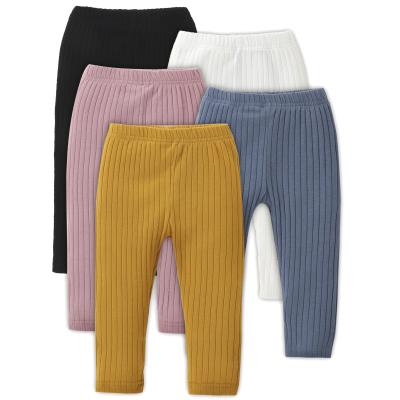 China Anti-Static Newborn Baby Clothes Solid Color Tie Strap Ribbed Cotton Autumn Winter 2021 Newborn Baby Pants for sale