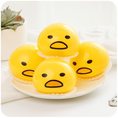 China Round Cute Yolk Silicone Sucking and Squishy Vomiting Squishy Egg Yolk Mud Ball Kids Relaxation Toy for sale