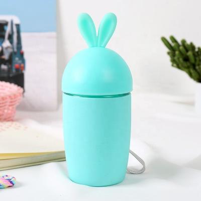 China Promotion Sustainable Custom Eco Friendly Kids Glass Water Bottle With Plastic Sleeve for sale