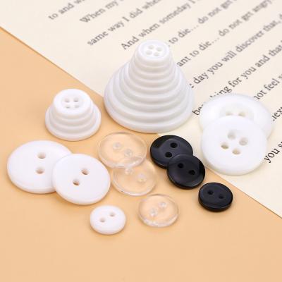 China Resin Button 2 Hole Cushion Resin Beveled Thin Edge Wide Running Washable Around Buttons For Sewing for sale