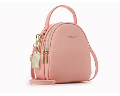 China Fashionable body bag double shoulder stock three - small diaper bag female cross - new design sense small backpack for sale