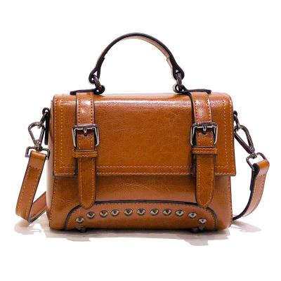 China 2022 new waterproof women's one-shoulder handbag with cross-body vintage Korean version rivet square bag for sale