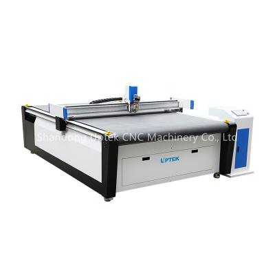 China Soft Materials Cutting Uptek EVA Leather PVC Pad Mat Cardboard Carbon Fiber Digital Flatbed Cutter for sale