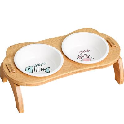 China Durable Ceramic Elevated Cat Bowl With Wood Stand No Spill Pet Food Water Feeder Bowl For Cats Small Dogs for sale