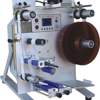 China SHENGLONG SL-130 semi-automatic food labeling machine for round bottles and cans for sale