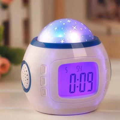 China Clock 1038 creative natural sound electronic clock alarm clock star music clock colorful lazy nap projection clock for sale