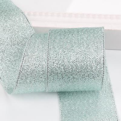 China 100% Polyester 38mm Glitter Satin Ribbon For Wedding Christmas Party Gift Bow Card Wrapping Decoration for sale