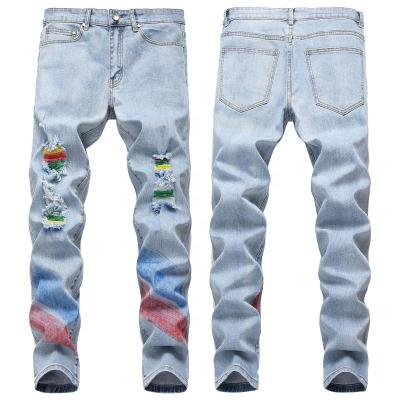 China New Arrivals Waterproof Stretch Holes Men's Jeans Fashion Design Hand Brush Painted Washed Men's Denim Pants for sale