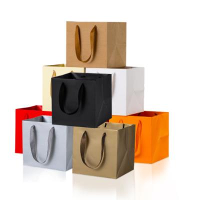 China Wholesale Customized Disposable Logo Shoes Clothing Paper Bags Kraft Paper Gift Bags for sale