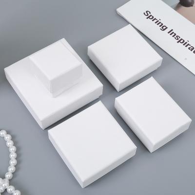 China New Recycled Materials White Present Rectangle Cardboard Box Gift Box High Grade Quartz Watches Jewelry Box Christmas Gift for sale