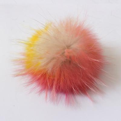 China Eco-friendly plant natural color wholesale raccoon fur pom pom detachable poms or multi large with snaps for sale