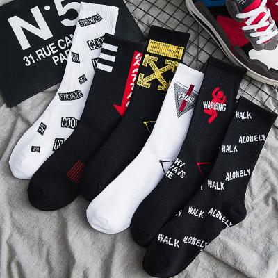 China Breathable cotton men's sports socks autumn and winter men's socks fashionable tube style hip-hop totem letter socks factory direct sales for sale