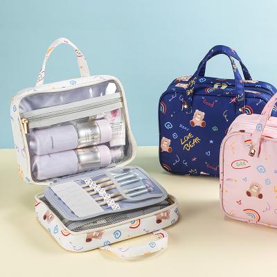 China Durable Large Capacity Custom Logo Travel Memory Fabric Storage Bag Zipper Handle Separation Folding Cosmetic Bag for sale