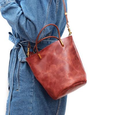 China Large Capacity PORTABLE Retro Outdoor Travel Tote Bags Women Shoulder Bag Genuine Leather Handbags for Wome for sale