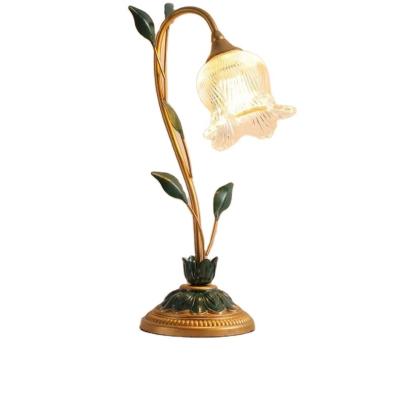 China Modern Dimmable Novelty Metal Bronze Flower Leaves Bedroom Bedside LED Table Light for sale