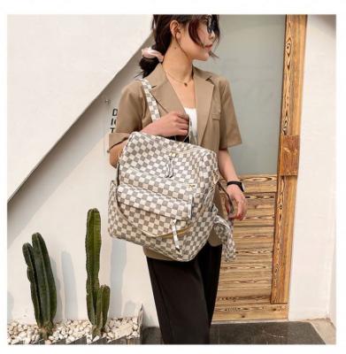 China PU Backpack Fashion Large Capacity Lattice Backpack Daily Used Student Schoolbag Tide Bag New for sale