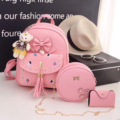 China The Other 2021 New Tassel Embroidery Bear All-match Pendant Backpack Student Backpack Three-piece Wallet for sale