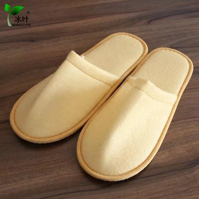 China EVA Anti-slippery Disposable Gold Single Guest Slipper Hotel Color Stocks Indoor Slipper for sale