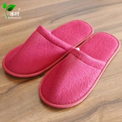 China EVA Anti-slippery Disposable Single Guest Slipper Hotel Red Color Stocks Indoor Slipper for sale