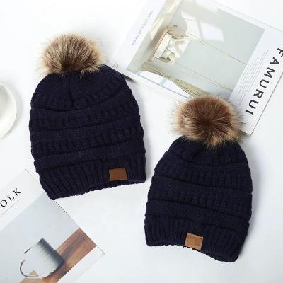 China COMMON Colorful Winter Warm Knitted Beanie Hat Women Girls Kids Pom-pom Hat for sale